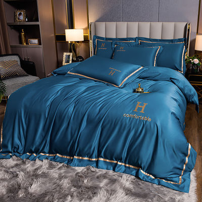 Moderne stijl hotel woonbedden solide kleur geborduurd wasgoed zijde dekbed set