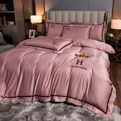 Home Polyester Luxe geborduurd wasgoed Zilk beddengoed Set met solide kleur dekbed