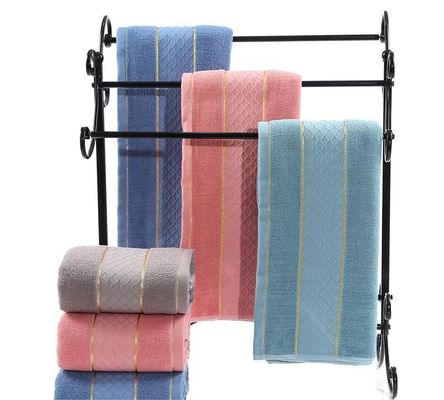 Hoog absorberende 32S katoenen handdoek met gouden rand en solide kleur gesneden stapel patroon