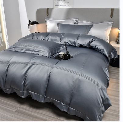 Ervaar comfort en stijl met deze vier-in-één Queen-size dekbedset van Tide Fashion